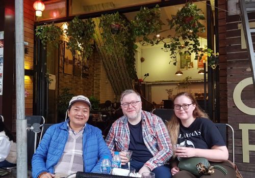 Our clients enjoying Vietnam's famous coffee, Giang Café