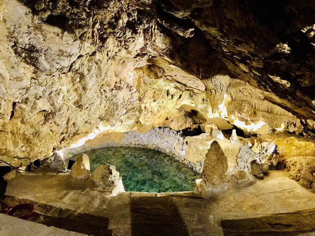 Am Tien cave featuring serene blue waters framed by timeless beauty (Source: Discover Ninh Binh)