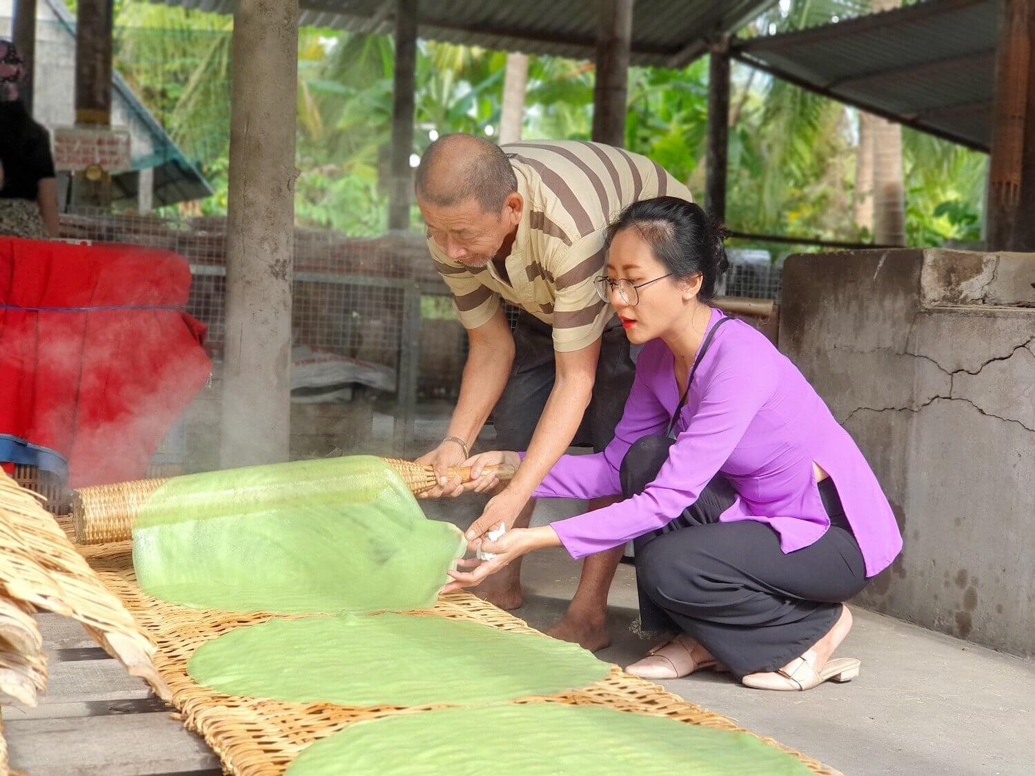 Engage in the process of rice noodle production (Source: Vietnam Budget Car Rental)