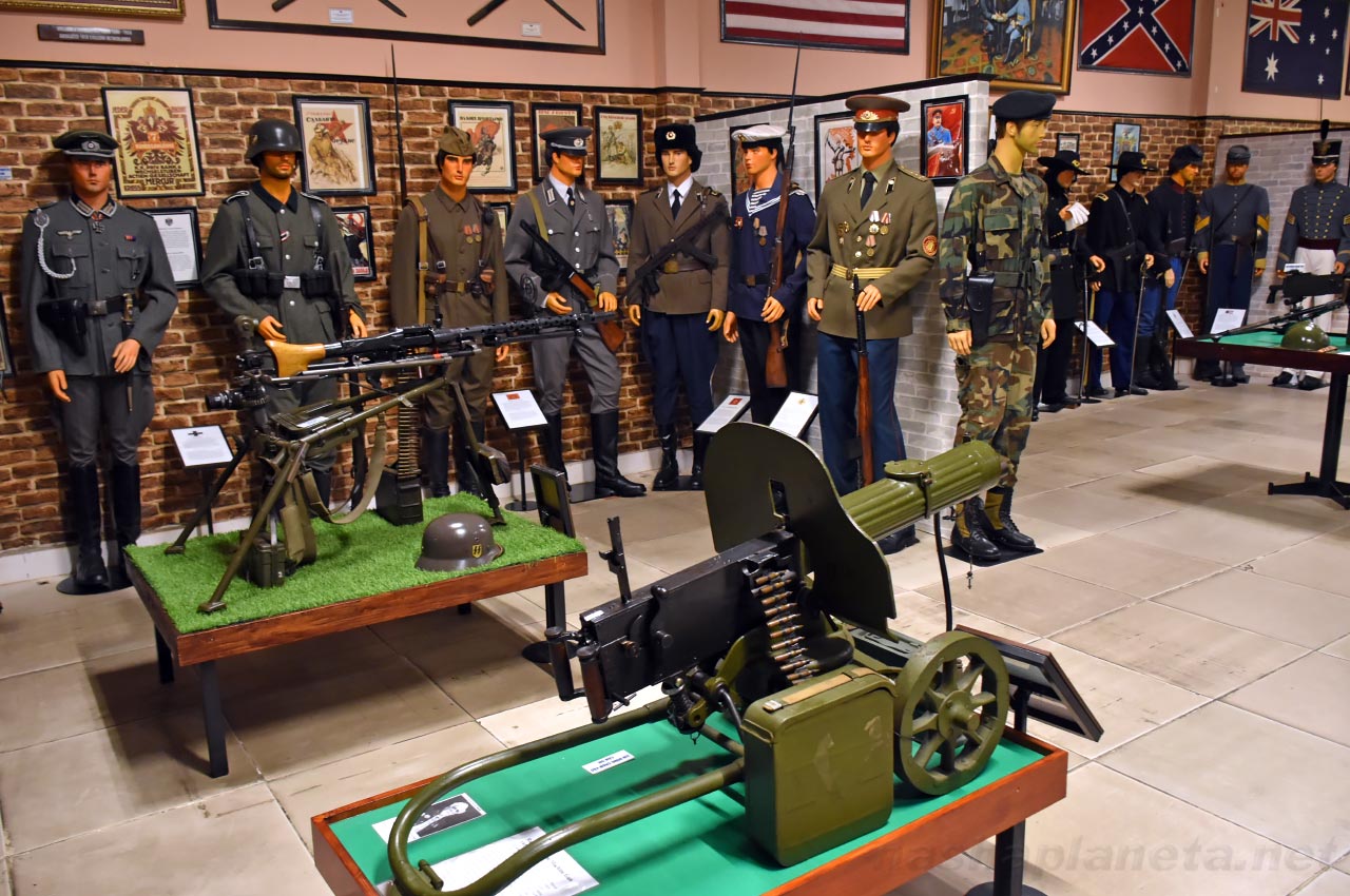 Visitors can examine bolt-action rifles, machine guns, and other firearms