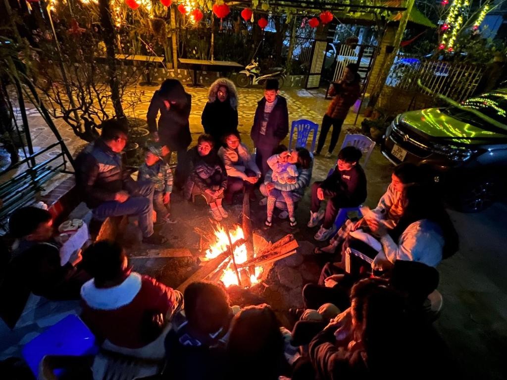 Villagers and guests gather around roaring campfires (Source: Asia Legend Travel)